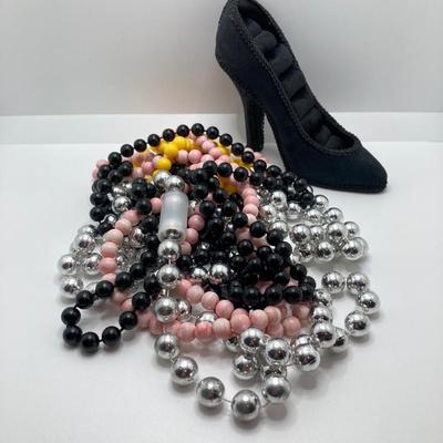 LOT 268: Flora Book Style Storage filled with Large Collection of Fashion Jewelry - Art and Huppke Included