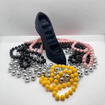 LOT 268: Flora Book Style Storage filled with Large Collection of Fashion Jewelry - Art and Huppke Included