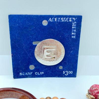 LOT 268: Flora Book Style Storage filled with Large Collection of Fashion Jewelry - Art and Huppke Included