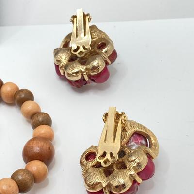 LOT 268: Flora Book Style Storage filled with Large Collection of Fashion Jewelry - Art and Huppke Included