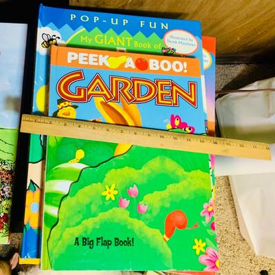 LOT 271: Wooden “Once Upon a Time” Cradle Loaded with Plush Animals and Oversized Children’s Books