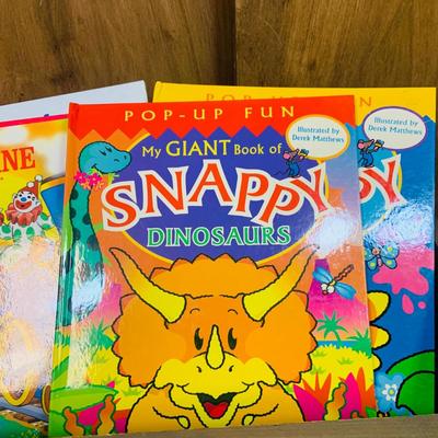 LOT 271: Wooden “Once Upon a Time” Cradle Loaded with Plush Animals and Oversized Children’s Books