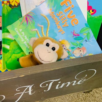 LOT 271: Wooden “Once Upon a Time” Cradle Loaded with Plush Animals and Oversized Children’s Books