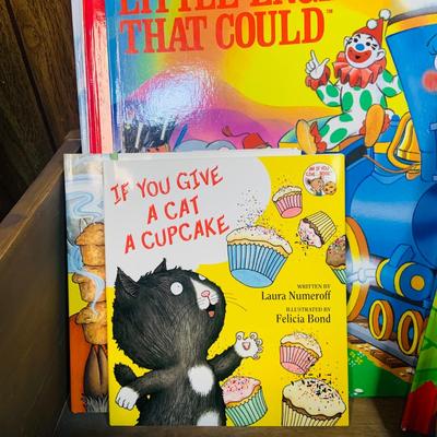 LOT 271: Wooden “Once Upon a Time” Cradle Loaded with Plush Animals and Oversized Children’s Books