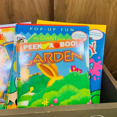 LOT 271: Wooden “Once Upon a Time” Cradle Loaded with Plush Animals and Oversized Children’s Books