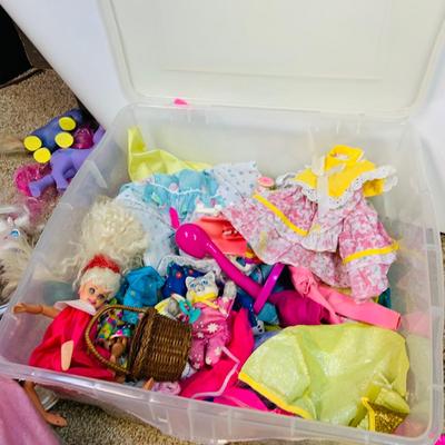 LOT 272: Collection of Barbie and Other Fashion Dolls, Clothing, Horses, a Polly Pocket Map Mat