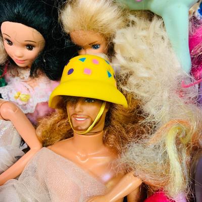 LOT 272: Collection of Barbie and Other Fashion Dolls, Clothing, Horses, a Polly Pocket Map Mat