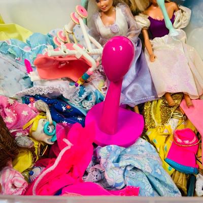LOT 272: Collection of Barbie and Other Fashion Dolls, Clothing, Horses, a Polly Pocket Map Mat