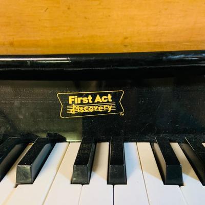 LOT 273: Collection of Children’s Musical Instruments Featuring FAO Schwartz’s Dance on Piano Mat; Bongos, Tambourine, Mini Piano and Guitar