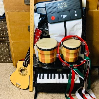 LOT 273: Collection of Children’s Musical Instruments Featuring FAO Schwartz’s Dance on Piano Mat; Bongos, Tambourine, Mini Piano and Guitar