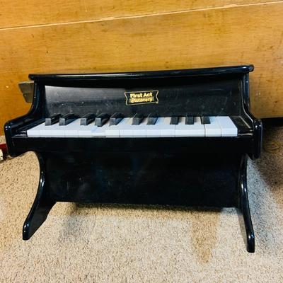 LOT 273: Collection of Children’s Musical Instruments Featuring FAO Schwartz’s Dance on Piano Mat; Bongos, Tambourine, Mini Piano and Guitar