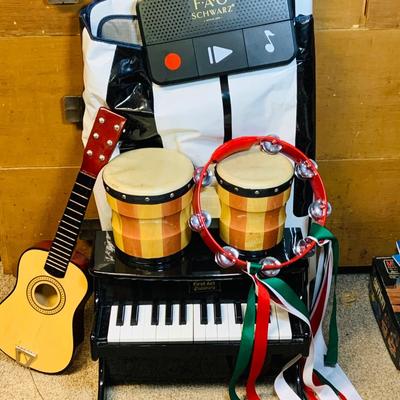 LOT 273: Collection of Children’s Musical Instruments Featuring FAO Schwartz’s Dance on Piano Mat; Bongos, Tambourine, Mini Piano and Guitar