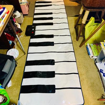 LOT 273: Collection of Children’s Musical Instruments Featuring FAO Schwartz’s Dance on Piano Mat; Bongos, Tambourine, Mini Piano and Guitar