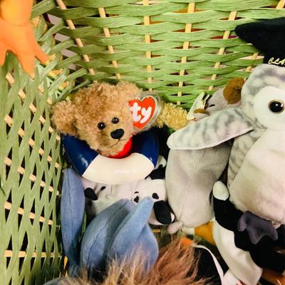 LOT 275: Green Wicker Trunk Loaded with Ty Beanie Babies and Mini Beanies