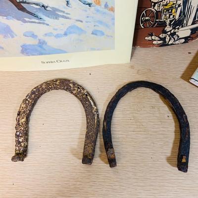 LOT 277: Cowboy Collection Featuring a Vintage Resistol Hat Box, Two (2) Cowboy Hats, Horseshoes and Books