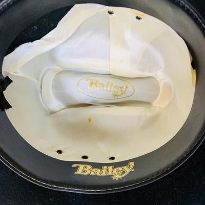 LOT 277: Cowboy Collection Featuring a Vintage Resistol Hat Box, Two (2) Cowboy Hats, Horseshoes and Books