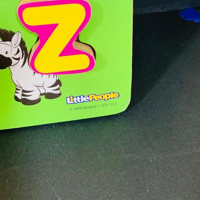 LOT 281: Assortment of Young Children’s Educational Toys, Books and Puzzles By Fisher Price and More