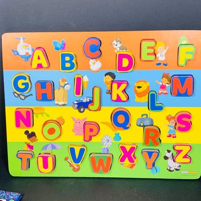 LOT 281: Assortment of Young Children’s Educational Toys, Books and Puzzles By Fisher Price and More