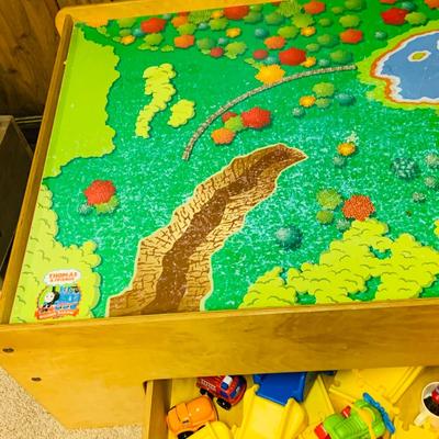 LOT 285: Thomas & Friends Wood Train Table with Drawer and Plastic Road Set