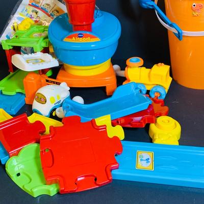 LOT 286: Collection of Children’s Toys Including Mr. Potato Head, V-Tech Airport Pieces, Fisher Price Puzzle and More