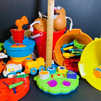 LOT 286: Collection of Children’s Toys Including Mr. Potato Head, V-Tech Airport Pieces, Fisher Price Puzzle and More