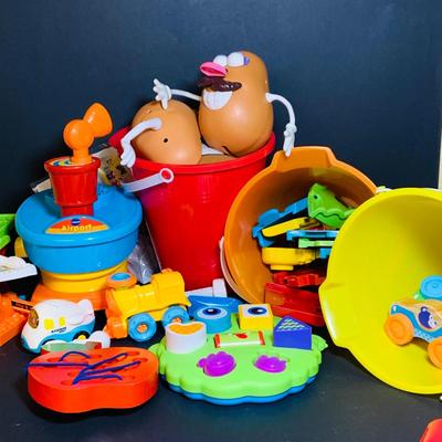 LOT 286: Collection of Children’s Toys Including Mr. Potato Head, V-Tech Airport Pieces, Fisher Price Puzzle and More