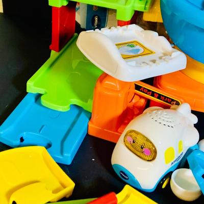 LOT 286: Collection of Children’s Toys Including Mr. Potato Head, V-Tech Airport Pieces, Fisher Price Puzzle and More
