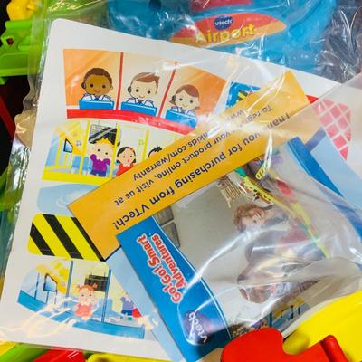 LOT 286: Collection of Children’s Toys Including Mr. Potato Head, V-Tech Airport Pieces, Fisher Price Puzzle and More