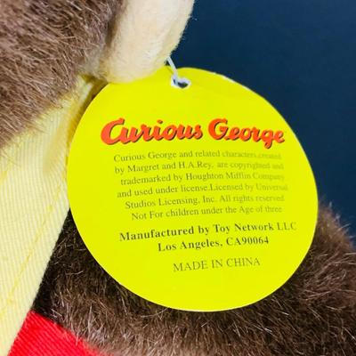LOT 288: Collection of Plushes Curious George, Paddington, Snidely Whiplash, Dudley Do Right’s Horse, Books and More