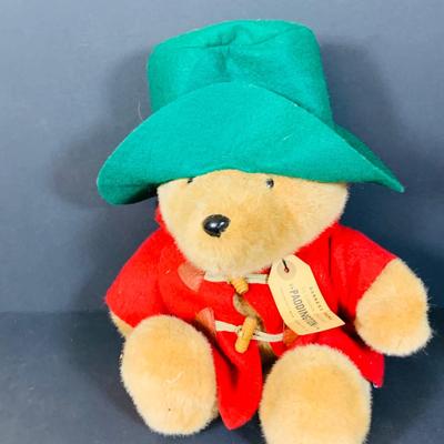 LOT 288: Collection of Plushes Curious George, Paddington, Snidely Whiplash, Dudley Do Right’s Horse, Books and More