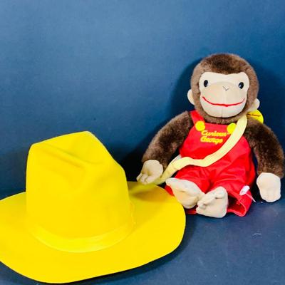 LOT 288: Collection of Plushes Curious George, Paddington, Snidely Whiplash, Dudley Do Right’s Horse, Books and More