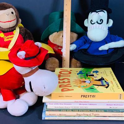 LOT 288: Collection of Plushes Curious George, Paddington, Snidely Whiplash, Dudley Do Right’s Horse, Books and More