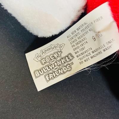 LOT 288: Collection of Plushes Curious George, Paddington, Snidely Whiplash, Dudley Do Right’s Horse, Books and More