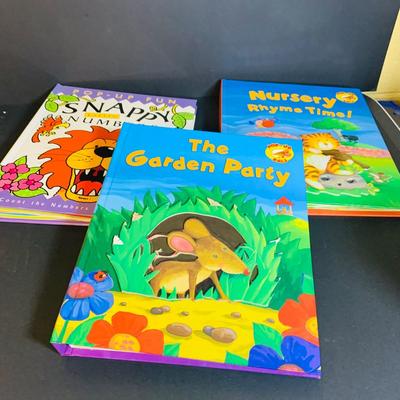 LOT 289. Melissa and Doug Latches Wooden Barn Full of Farm Puzzles and More; Set of Two Fisher Price Sing-ama-lings and Pop-up Books