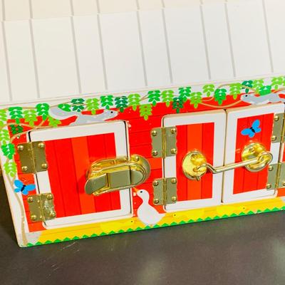 LOT 289. Melissa and Doug Latches Wooden Barn Full of Farm Puzzles and More; Set of Two Fisher Price Sing-ama-lings and Pop-up Books