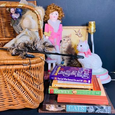 LOT 290: Crazy Cat Collection Featuring Cat Lady Nut Cracker, Cat Lamp, Books, Plush Wicker Basket Cat Toy and More
