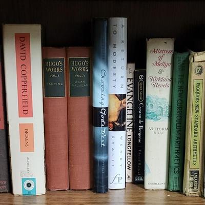 LOT 304: Three Rows of Various Assortment of Books