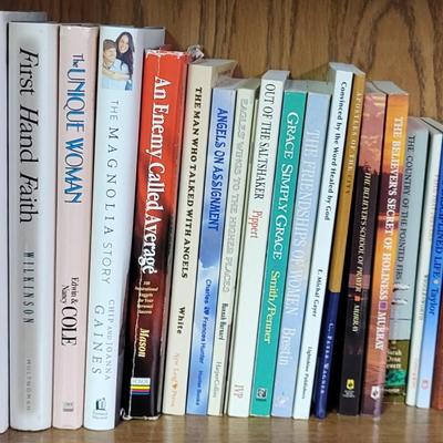 LOT 310: Two Bookshelf Rows of Assortment of Christian Books