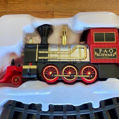 LOT 316: FAO Schwarz 30-Piece Motorized Train Set in Original Box