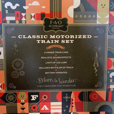 LOT 316: FAO Schwarz 30-Piece Motorized Train Set in Original Box