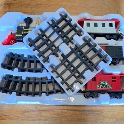 LOT 316: FAO Schwarz 30-Piece Motorized Train Set in Original Box