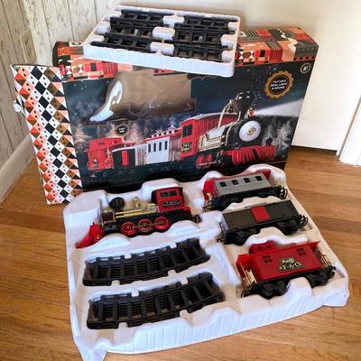 LOT 316: FAO Schwarz 30-Piece Motorized Train Set in Original Box