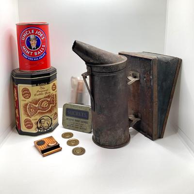 LOT 319: Antique / Vintage Bee Keepers Supplies Bee Smoker, Vintage Tins, Tokens, Notre Dame Matchbook and More