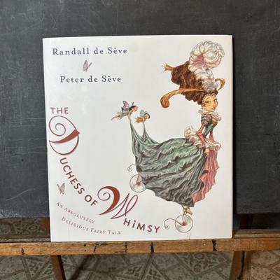 LOT 339: Vintage Children" Desk & Chalkboard, Erector Set Box, Pink Metal Stove along with 4 Children's Books