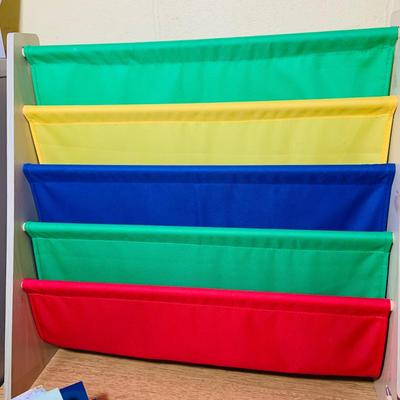 LOT 353: Children’s Desk Full of Learning Essentials Including Colorful Canvas and Wood Book Stand, Rustic Log Pencils and Pens, Storage...