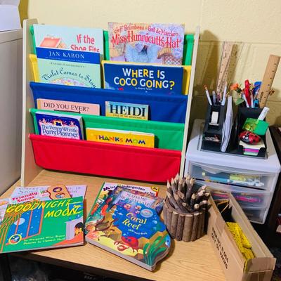 LOT 353: Children’s Desk Full of Learning Essentials Including Colorful Canvas and Wood Book Stand, Rustic Log Pencils and Pens, Storage...