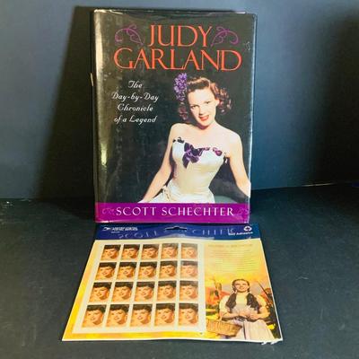 LOT 360: Collection Inspired by Remarkable Women Including Judy Garland Book and Stamps, Audrey Hepburn Books, and More