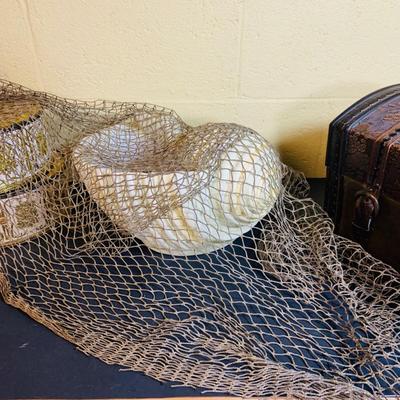 LOT 367: Giant Ceramic Sea Shell. Planter, Fishing Net, Wooden Treasure Chest Box, and Vintage Guildcraft Tins