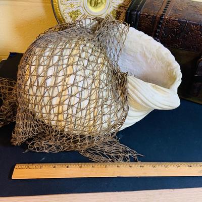 LOT 367: Giant Ceramic Sea Shell. Planter, Fishing Net, Wooden Treasure Chest Box, and Vintage Guildcraft Tins