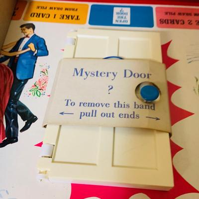 LOT 369: Collection of Games Including Vintage Mystery Date Game, Twister, Simon and More